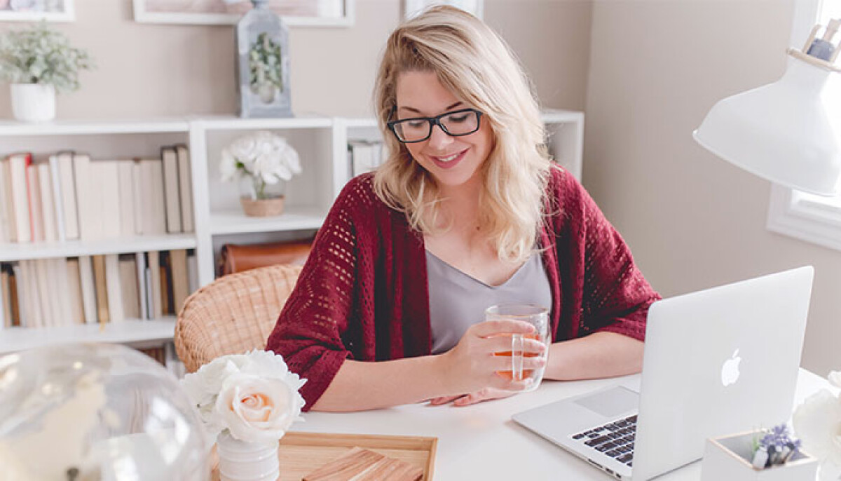 Lady looking relaxed and happy after bundling her power and broadband