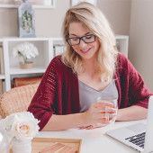 Lady looking relaxed and happy after bundling her power and broadband